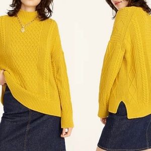 Long cotton cable-knit mockneck sweater